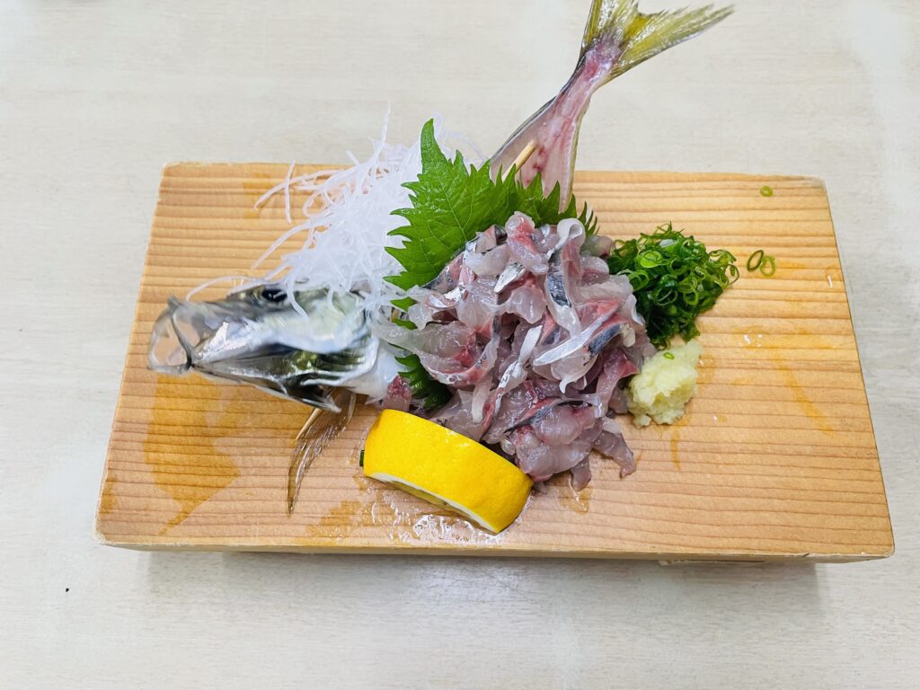 a plate of aji tataki (minced raw horse mackerel).